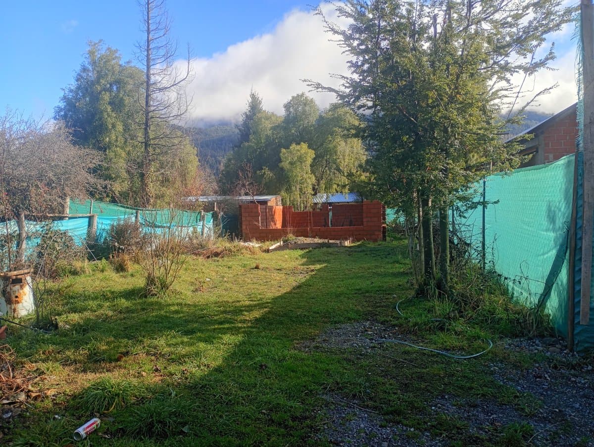 Terreno con construcción en obra y titulo de propiedad en lago puelo 300 metros 